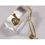 18CT HEART PENDANT. 18ct blue topaz and diamond heart pendant on 18ct gold chain