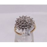 9CT DIAMOND CLUSTER. 9ct gold 1,00ct diamond cluster ring, size L