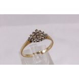 9CT DIAMOND RING. 9ct gold ring with 17 small diamonds forming diamond shape, size N