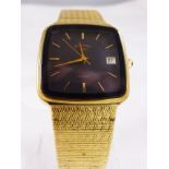 GENTS ROTARY WRISTWATCH. Gents Rotary gold plated black faced quartz wristwatch