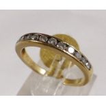 9CT DIAMOND RING. 9ct gold eleven diamond eternity ring