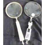 TWO MAGNIFYING GLASSES. Two magnifying glasses with mother of pearl handles, L ~ 26cm