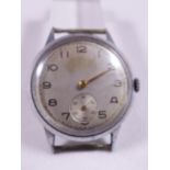GENTS WRISTWATCH. Gents mechanical wristwatch with gold hands
