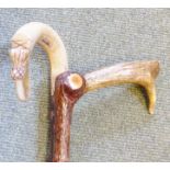 WALKING STICKS. Two horn handled walking sticks