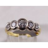 18CT DIAMOND RING. 18ct gold 0,50ct five stone diamond ring, size L