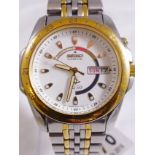 SEIKO VINTAGE WRISTWATCH. Vintage gents stainless steel Seiko kinetic wristwatch with white dial