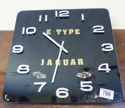 CLOCK. Square clock with Jaguar to face