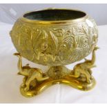 INDIAN BRASS BOWL. Intracately embossed Indian brass bowl on elephant stand