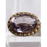 SEED PEARL BROOCH. Vintage seed pearl and amethyst brooch, presumed gold