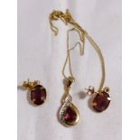 9CT PENDANT AND EARRINGS. 9ct gold garnet pendant and earrings set