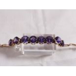 9CT BRACELET. 9ct gold alexandrite bracelet