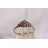 9CT DIAMOND RING. 9ct gold ring with 17 small diamonds forming diamond shape, size N