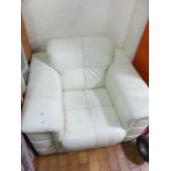 LEATHER CHAIR. Large ivory coloured leather lounge chair