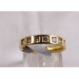 18CT DIAMOND RING. 18ct gold diamond set band, 0,40ct, size J