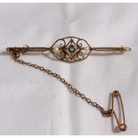 15CT PEARL BROOCH. 15ct gold bar brooch with topaz and seed pearls