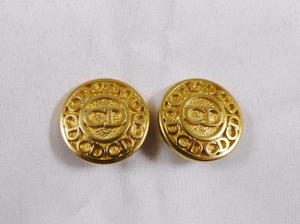 DIOR EARRINGS. Gold coloured Dior clip on earrings