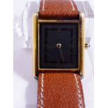 LADIES CARTIER WRISTWATCH. Gold plated ladies silver Cartier wristwatch with brown leather Cartier