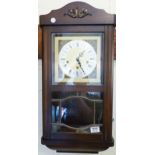 WESTMINSTER CHIME CLOCK. Oak cased Westminster chime wall clock