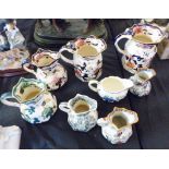 MASONS JUGS. Eight Masons Ironstone jugs including a sauce boat