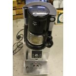 DELONGHI COFFEE MACHINE - a Delonghi coffee machine and grinder.