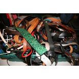 VINTAGE BELTS - a box filled with vintage belts of numerous styles and material.