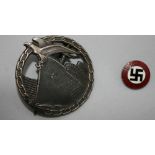 THIRD REICH BADGES - two items from the Third Reich to include a German 23mm NSDAP - National