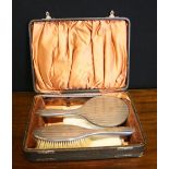 SILVER SET - a boxed Birmingham silver brush and mirror set,