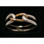 GEORG JENSEN - a double loop gold and silver ring with an interlocking chain link by Georg Jensen