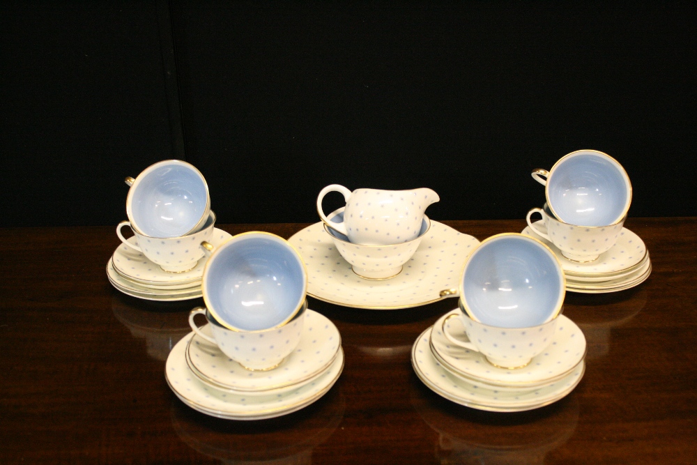 SUSIE COOPER TEA SET - a Susie Cooper Tea set comprising of 8 cups, saucers,