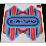 THE BEATLES FIRST LP - A collectible first pressing of this compilation with Barry Zaid pop art