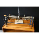 WALLPAPER CUTTER - a vintage wallpaper cutting machine including original instructions.