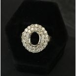 9CT DIAMOND RING - mount encrusted with 36 small diamonds but missing central stone.