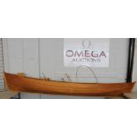 WOODEN BOAT - a custom built wooden boat, clinker construction, seating incomplete.