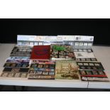 ALBUMS & PRESENTATION PACKS - a collection of stamp albums and presentation packs to include The