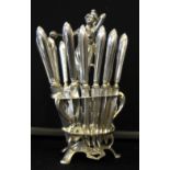 APPLE KNIFE SET - a silver coloured apple knife set featuring a central female figure surrounded by