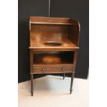 GEORGE IV WASH STAND - a George IV mahogany wash stand measuring 123.5x75x57cm.