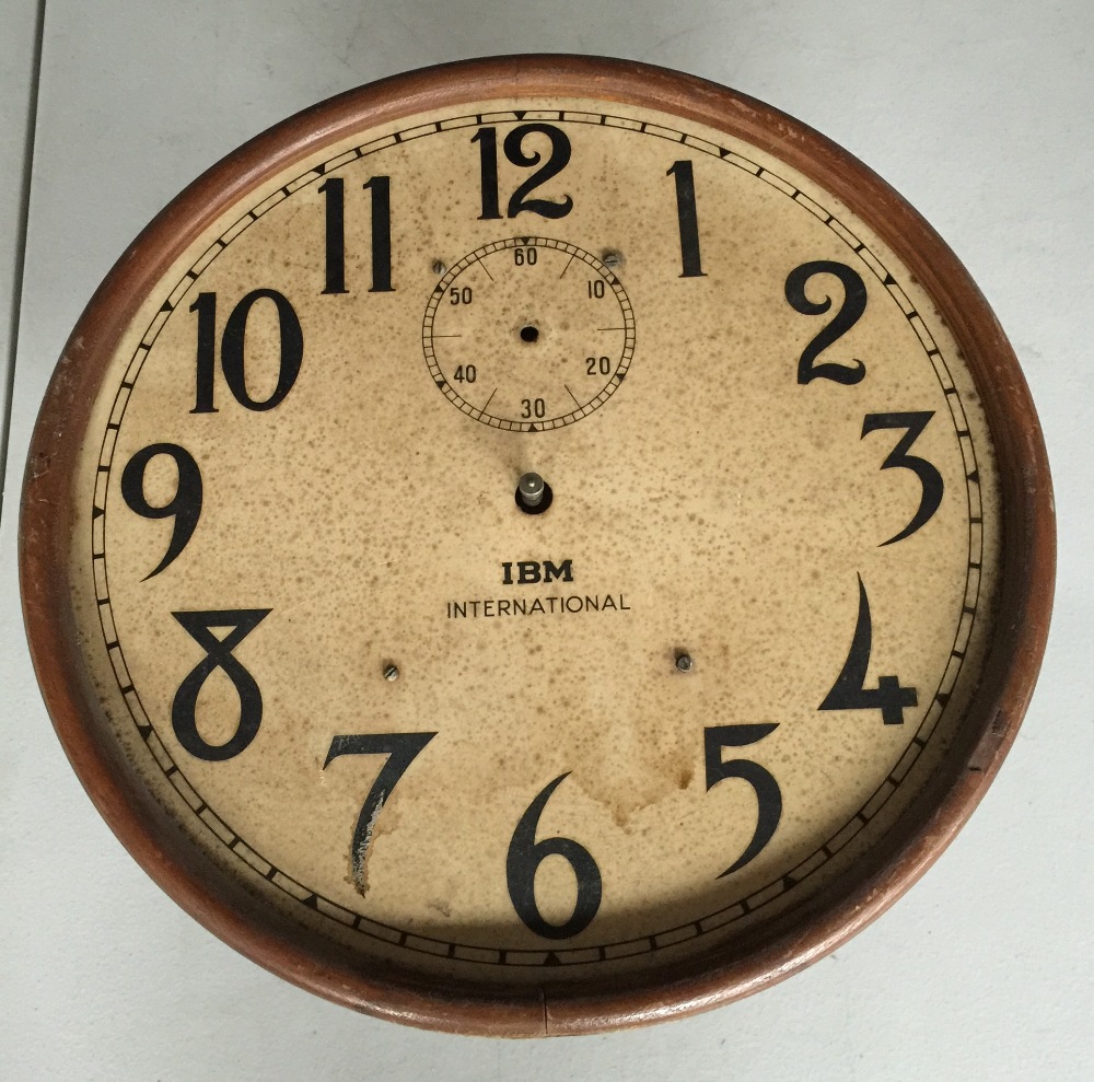 IBM SLAVE CLOCK - foxing to dial and movement in need of repair.