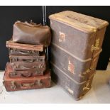 TRUNK & SUITCASES - a vintage travelling trunk with inner shelf and 7 brown leather suitcases and