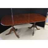 DINING TABLE - an extending dining table with claw feet,