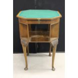 CARD TABLE - a vintage wooden card table with rotating top measuring 70cm by 51cm.