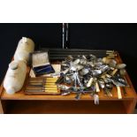 HOMEWARE - a selection of items to include cutlery and two Victorian hot water bottles,