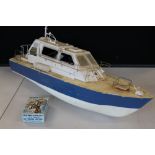 VINTAGE TOY BOAT - a vintage plastic toy boat along with a boxed Water Sprite battery operated