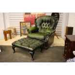 CHESTERFIELD STYLE ARMCHAIR - a Chesterfield style armchair in green leather with matching pouf.