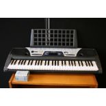 CASIO DIGITAL SYNTHESIZER - a boxed Casio CZ-101 Digital Synthesizer keyboard and an EZ-150 Yamaha