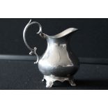 SILVER CREAM JUG - a silver cream jug standing at 13cm tall and weighs 173.52g. Continental marks.