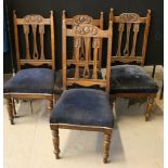 DINING ROOM CHAIRS - 4 matching dining room chairs all upholstered in dark blue fabric.