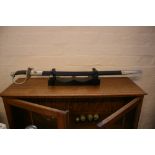 SWORD - a reproduction stainless steel sword with wooden mount.