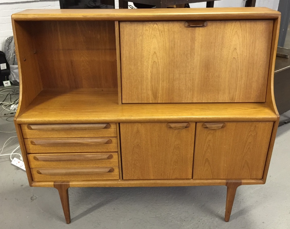 BUREAU - a teak bureau featuring 4 sliding drawers,