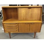 BUREAU - a teak bureau featuring 4 sliding drawers,