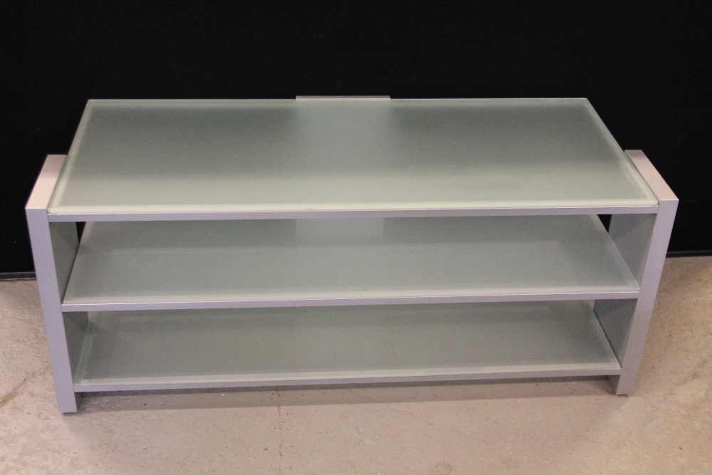 GLASS TV CABINET - a three shelf frosted glass tv cabinet measuring 18hx45wx18d. c2006.